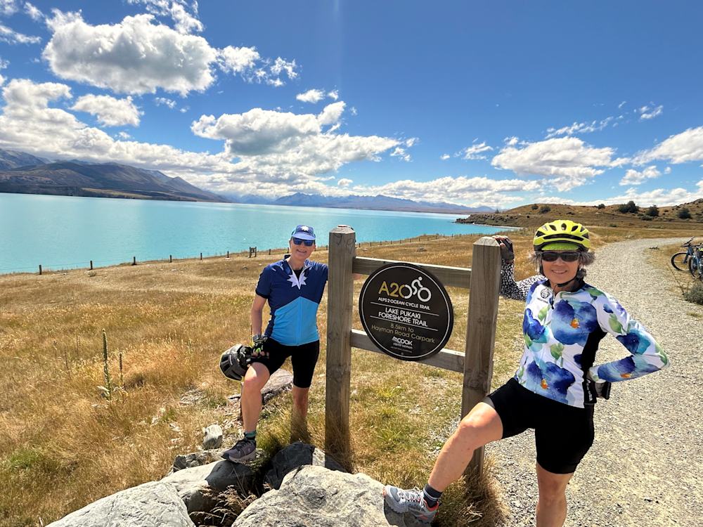 Guests pausing for a photo on the Alps to Ocean trail in New Zealand